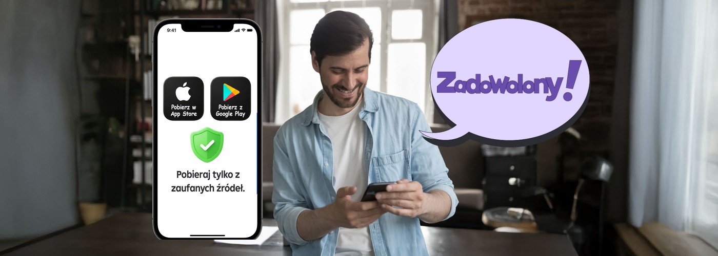 Zadowolony mężczyzna trzymający telefon w rękach, po pobraniu aplikacji